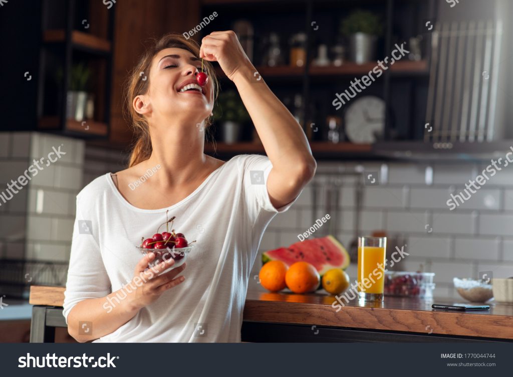 stock-photo-young-beautiful-women-eating-cherries-1770044744